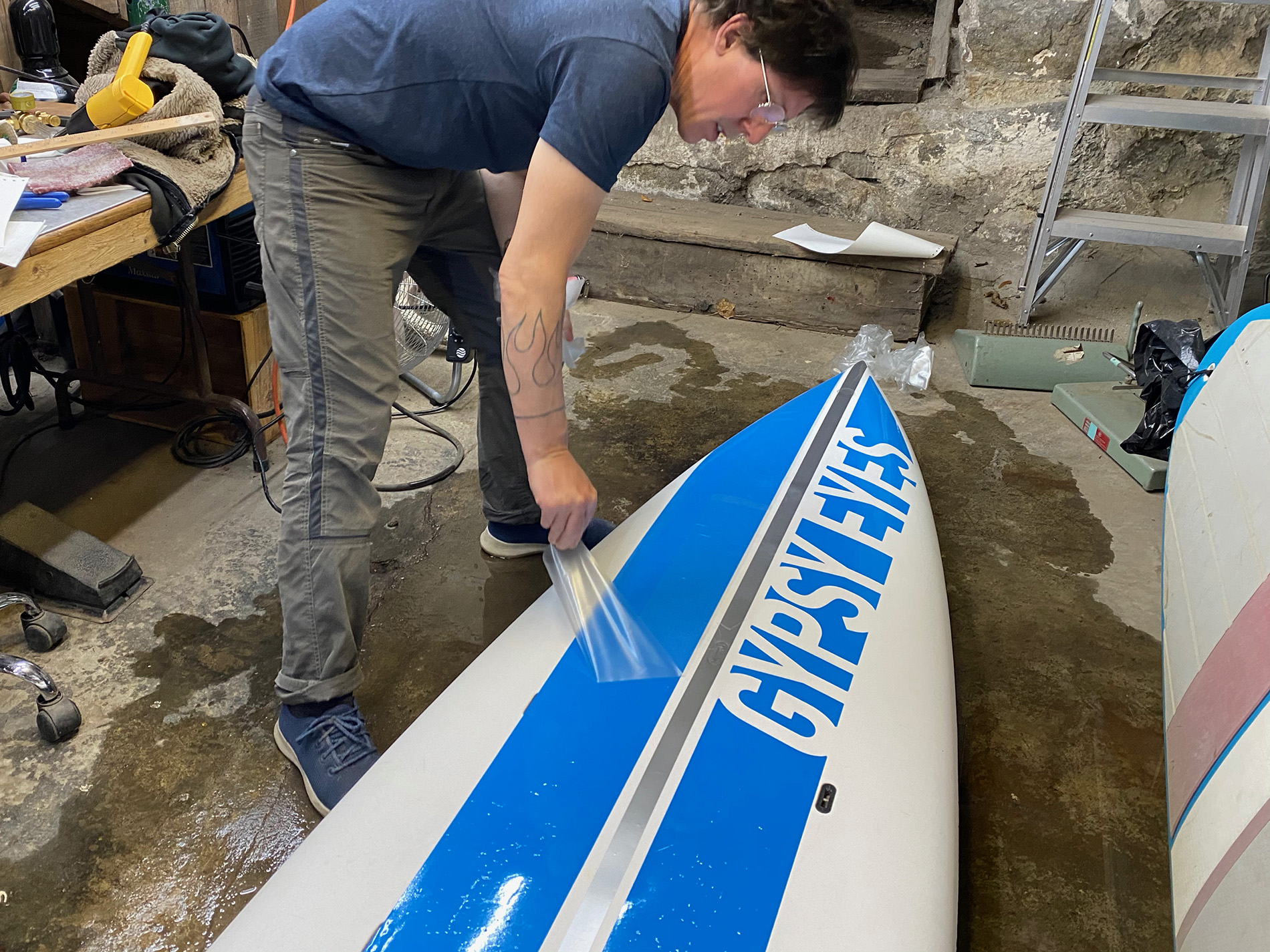 a bare white SUP